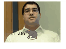 a man wearing glasses and a white shirt has a picture of a mouse and the words oi rato