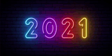 a neon sign of the year 2021 on a brick wall .