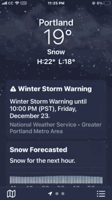 a phone screen shows the weather for portland