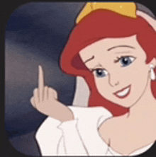 a cartoon of a little mermaid giving the middle finger .