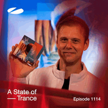 a man holding a cd with the words a state of trance episode 1114