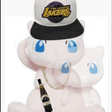 a stuffed animal wearing a lakers hat and chain