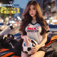 a woman holding a soccer ball wearing a mix parlay shirt