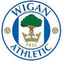 the logo for wigan athletic shows a tree with a crown and a soccer ball .