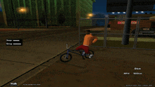 a screenshot of a video game shows a man riding a bike and a fence