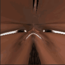 a blurred image of a person 's face with a few lines on it