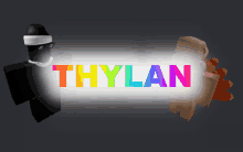 a rainbow colored sign that says thylan