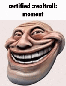 a picture of a troll face with the words `` certified real troll : moment '' .