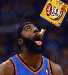 a box of totino 's pizza rolls is being thrown in the air by a basketball player