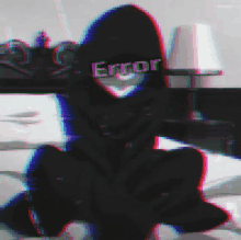 a person wearing a black hoodie that says error