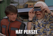 two men are looking through binoculars with the word hat persze on the bottom right