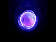 a purple and blue sphere is floating in the air on a dark background .