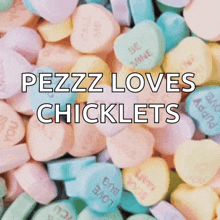 a pile of heart shaped candy with the words pezz loves chicklets