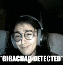 a woman wearing glasses and headphones with the words gigachad detected below her