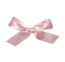 a close up of a pink ribbon bow on a white background .