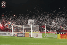 a soccer field with a banner that says ters on it