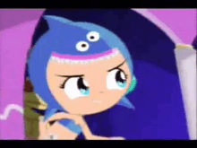 a cartoon girl with blue hair and blue eyes is standing in front of a purple wall .