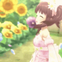 a girl in a pink dress is blowing bubbles in front of a field of sunflowers .