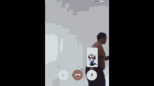 a phone screen shows a video call with a picture of a boy on the screen