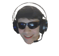 a man wearing headphones and sunglasses is smiling .