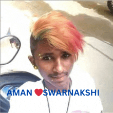 a man with a mohawk and the name aman swarnakshi