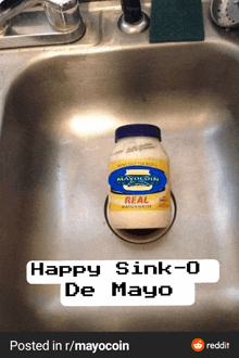 a bottle of mayo coin sits in a sink with the caption happy sink-0 de mayo