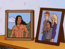 two framed pictures of a man and a woman are on a shelf