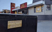 a mcdonald 's with a sign that says it was at this spot in the evening of the 20th september