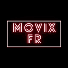 a neon sign that says movix fr is glowing in the dark .