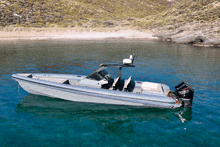 a mercury outboard motor is attached to the side of a boat