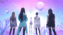 a group of women are standing in front of a purple and blue background