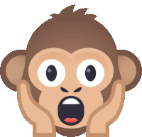 a monkey with a surprised expression on its face