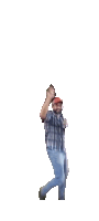 a man wearing a plaid shirt and a red hat is dancing with his hands in the air