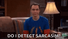 sheldon cooper from the big bang theory is sitting on a couch with a lamp .