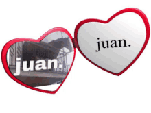 a heart shaped mirror has the name juan on it