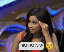 a woman has a speech bubble that says disgusting on it