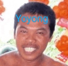 a close up of a man 's face with yoyong written on his forehead