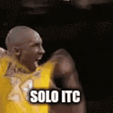 a basketball player in a yellow jersey with the words solo itc written on it .