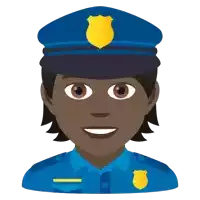 a female police officer is smiling and wearing a blue hat