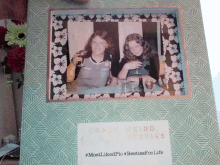 two women sitting at a table with a sign that says " crazy weird besties "