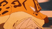 a close up of a cartoon character 's face with a tiger print on it