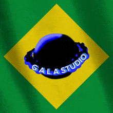 a logo for gala studio is on a yellow and green background