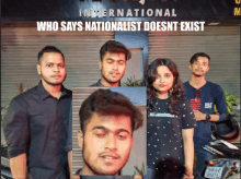 a group of young people standing in front of a sign that says international who says nationalist doesnt exist