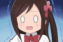 a girl with a bow on her hair is making a surprised face with her eyes closed