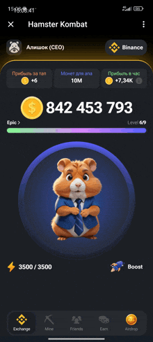 a hamster in a blue shirt and tie is displayed on a phone screen