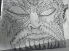 a black and white drawing of a monster 's face with teeth