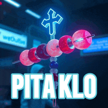 a pita klo sign with a cross on top