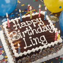 a birthday cake that says happy birthday ling with candles