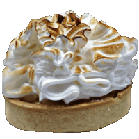 a close up of a pie with whipped cream and toasted meringue