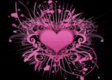 a pink heart is on a black background